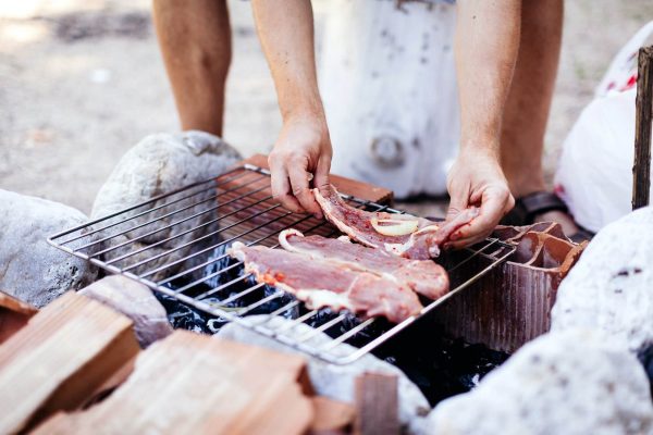 man cooking bbq